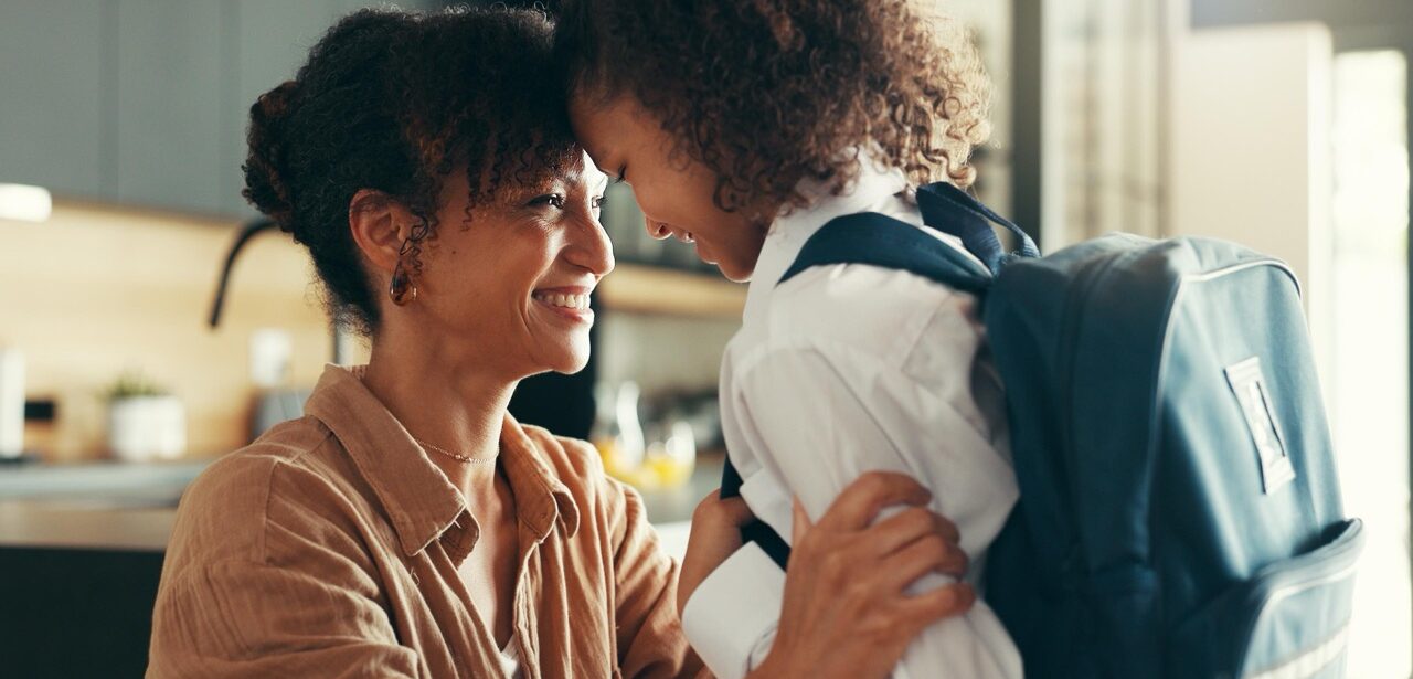 Parent prepares child for an allergy-safe school year